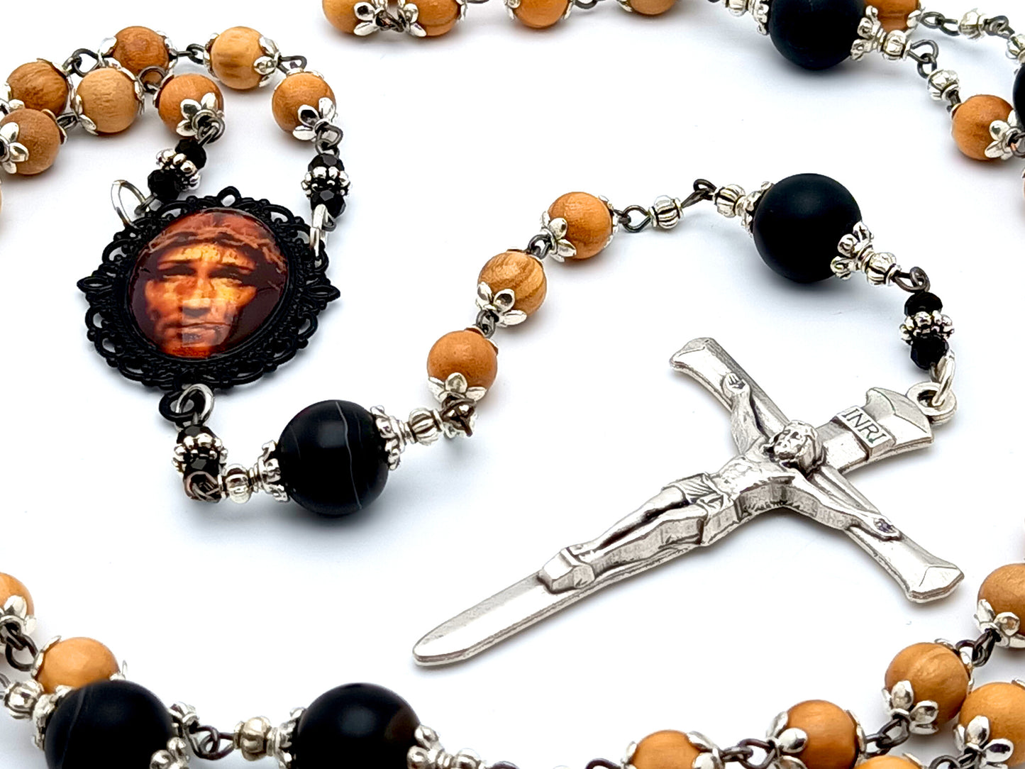 Holy face of Jesus unique rosary beads with wooden and onyx beads, silver nail crucifix and picture centre medal.