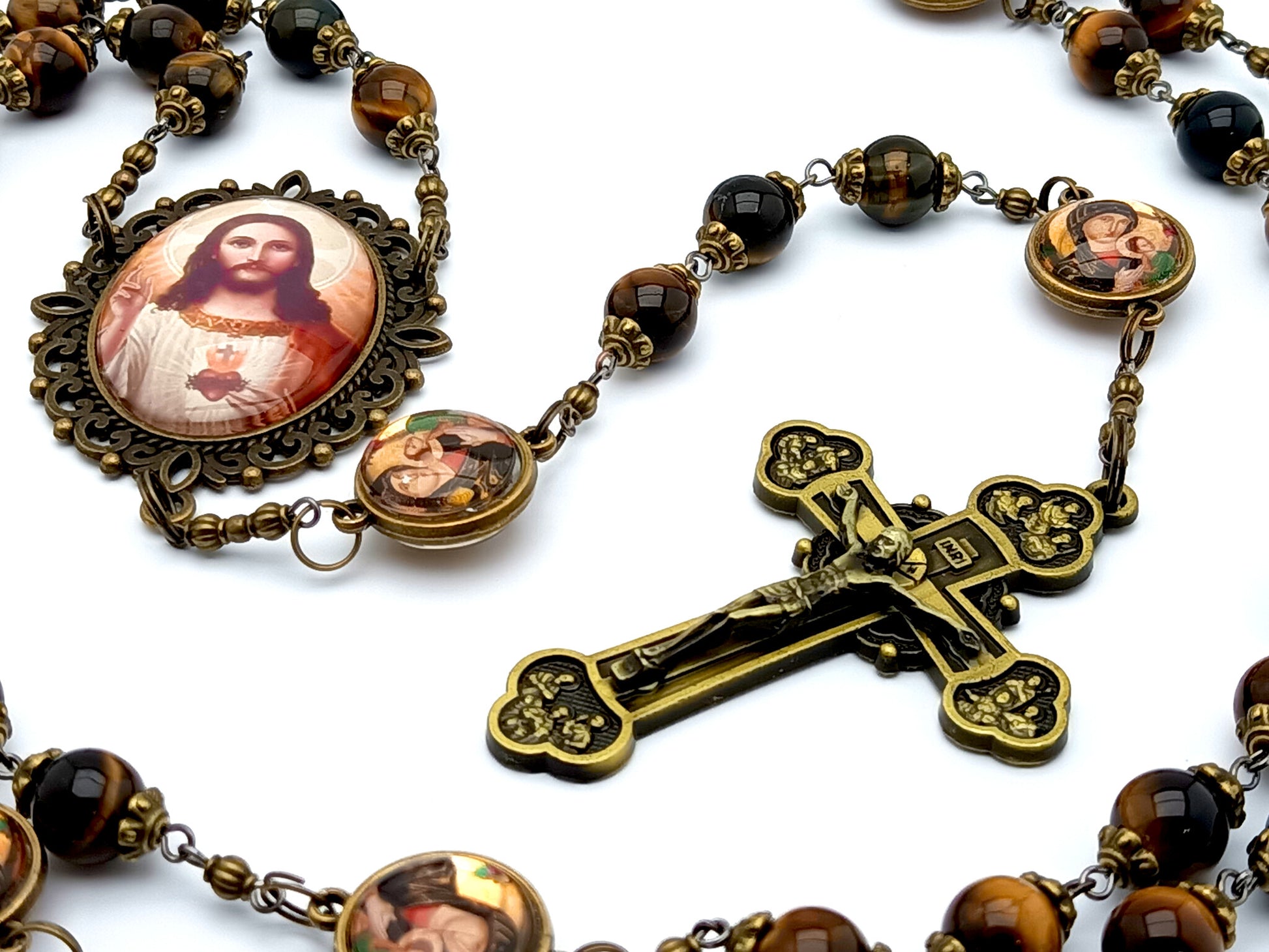 Sacred Heart unique rosary beads with tigers eye gemstone beads and Our Lady of Perpetual Help picture pater beads, bronze twelve apostles crucifix and picture centre medal.