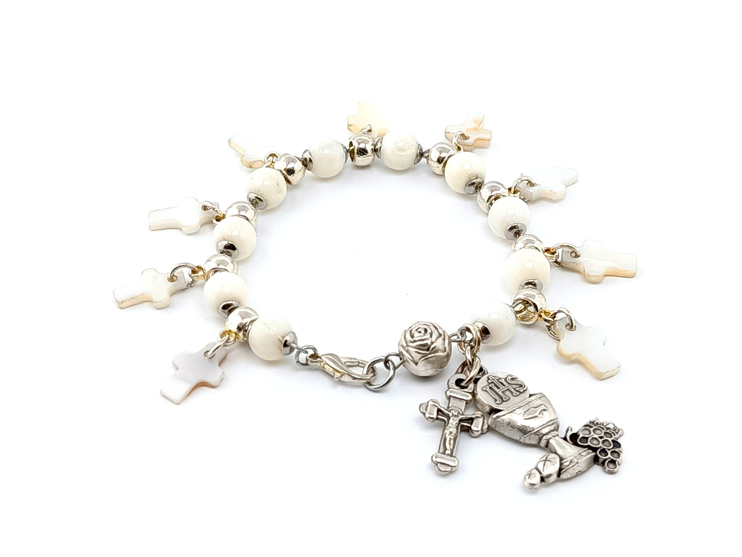 First Holy Communion unique rosary beads bracelet with mother of pearl beads and crosses, small crucifix and chalice medal.