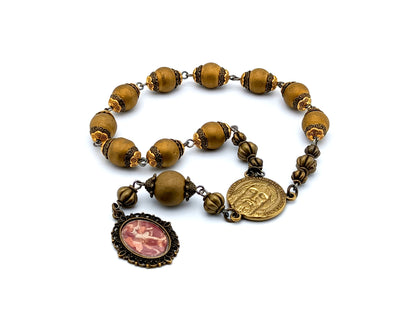 Saint Michael unique rosary beads single decade rosary with golden glass and bronze beads, bronze Holy Face centre medal and Saint Michael picture end medal.