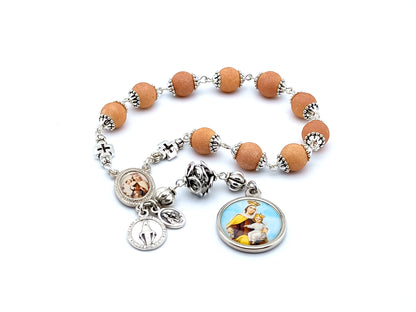 Our Lady of Mount Carmel unique rosary beads single decade rosary with buff glass and silver lattice beads, silver picture centre and end medals.