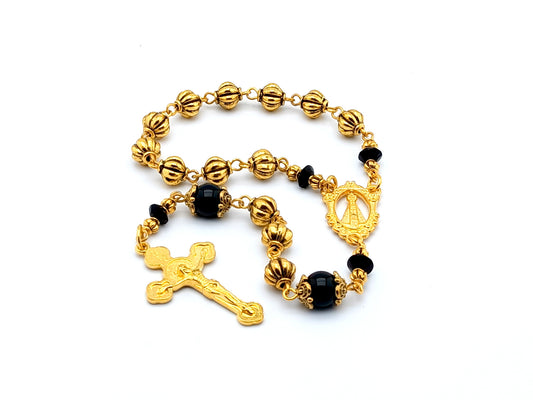 Our Lady of Loretto unique rosary beads single decade rosary with onyx and gold pumpkin beads, gold centre medal and Saint Benedict crucifix.