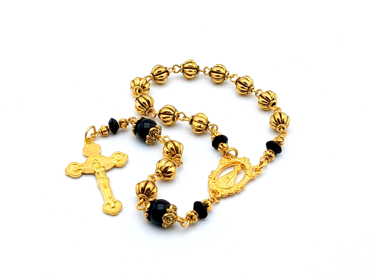 Our Lady of Loretto unique rosary beads single decade rosary with onyx and gold pumpkin beads, gold centre medal and Saint Benedict crucifix.