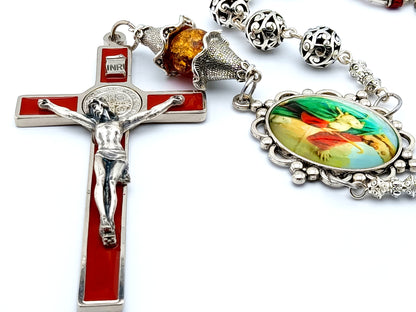 Large red enamel Saint Benedict wall crucifix and single decade Jesus the good Shepard Tibetan silver rosary.