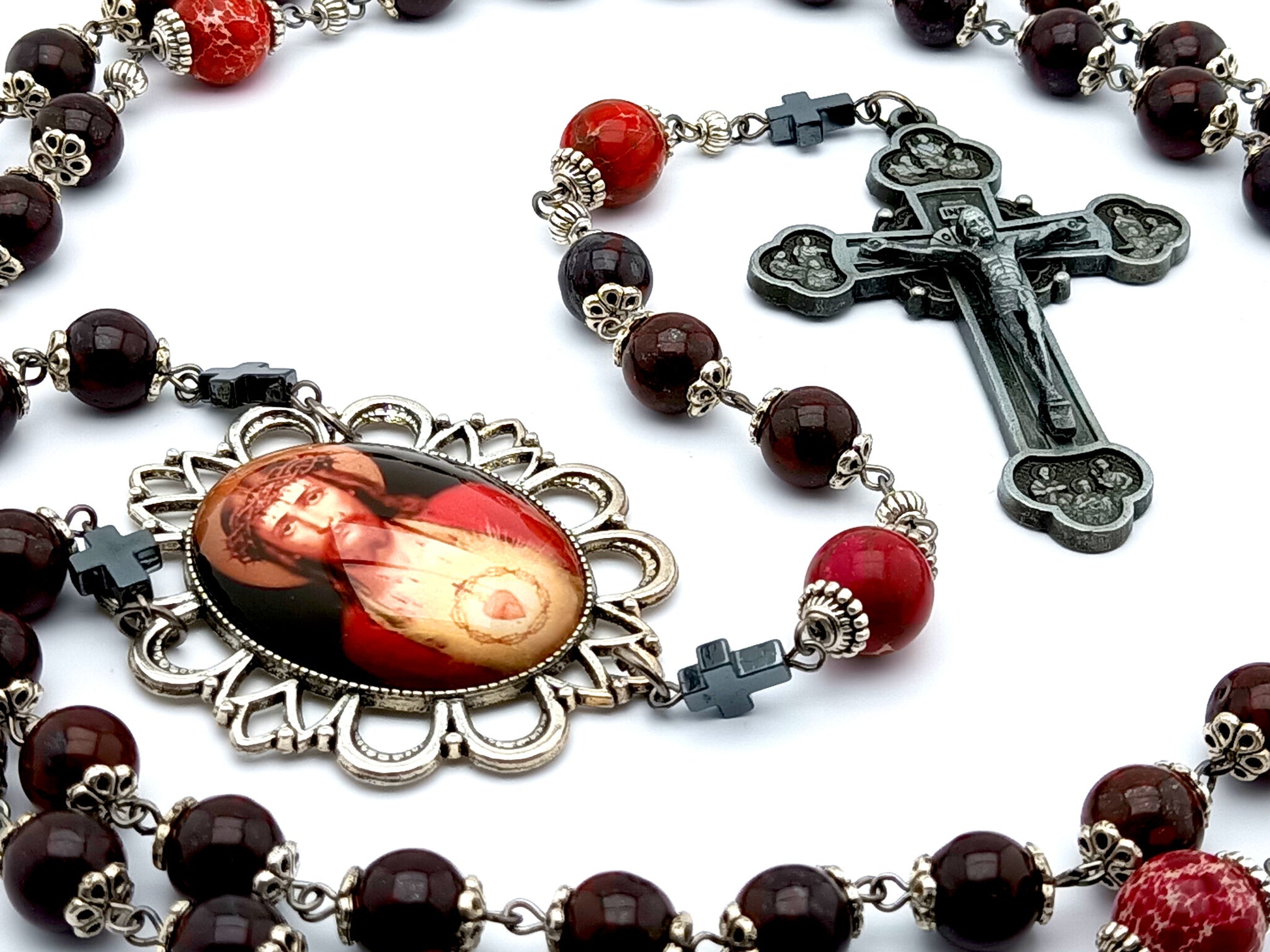 Sacred Heart unique rosary beads with deep red gemstone beads, pewter Twelve Apostles crucifix and silver picture centre medal.