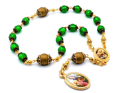 Saint Ann unique rosary beads prayer chaplet with green and gold glass beads and golden picture centre and end medals.