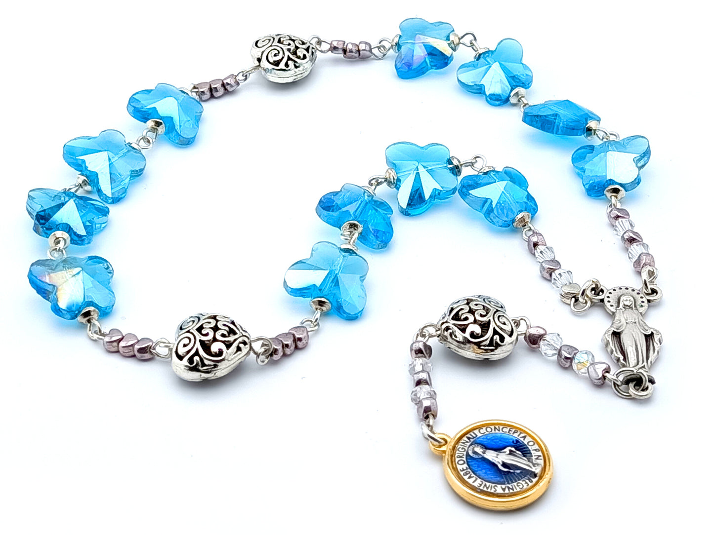 The Immaculate Conception unique rosary beads prayer chaplet with blue crystal and silver filigree heart beads, Our Lady centre medal and Miraculous medal. 