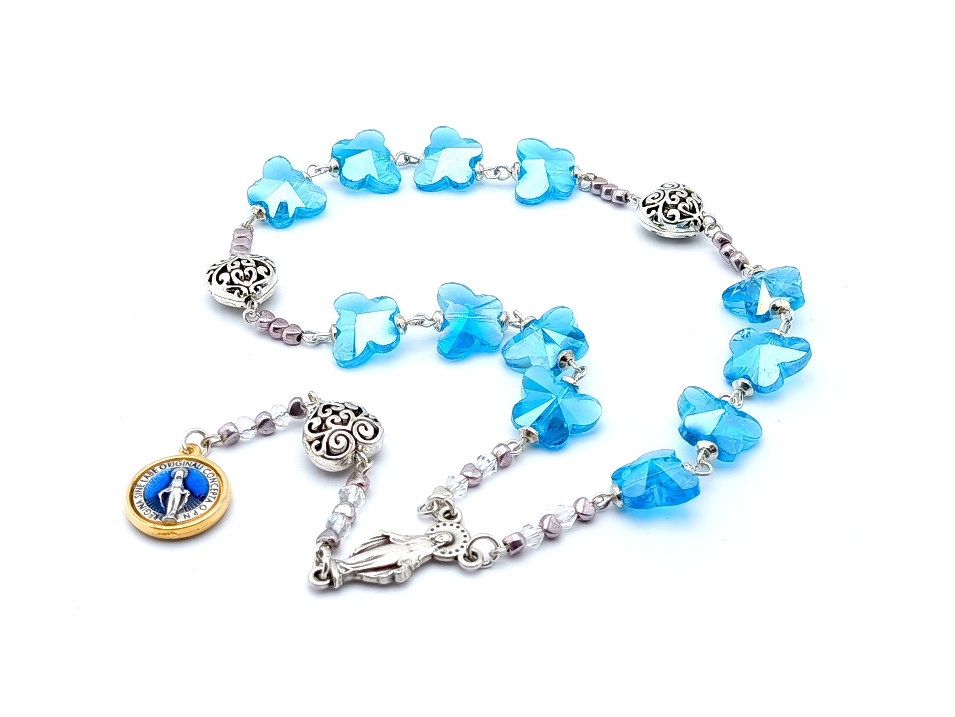 The Immaculate Conception unique rosary beads prayer chaplet with blue crystal and silver filigree heart beads, Our Lady centre medal and Miraculous medal. 