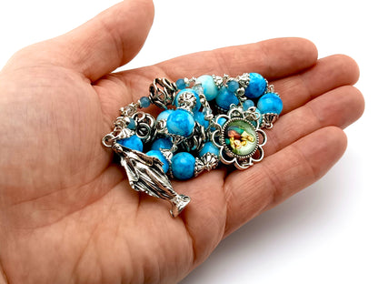 Saint Ann unique rosary beads prayer chaplet with blue and white marbled glass and silver beads, picture centre medal and Our Lady statue end medal.