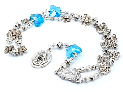 Saint Ann unique rosary beads prayer chaplet with silver butterfly and blue crystal beads, Miraculous medal centre and  Saint Ann end medal.