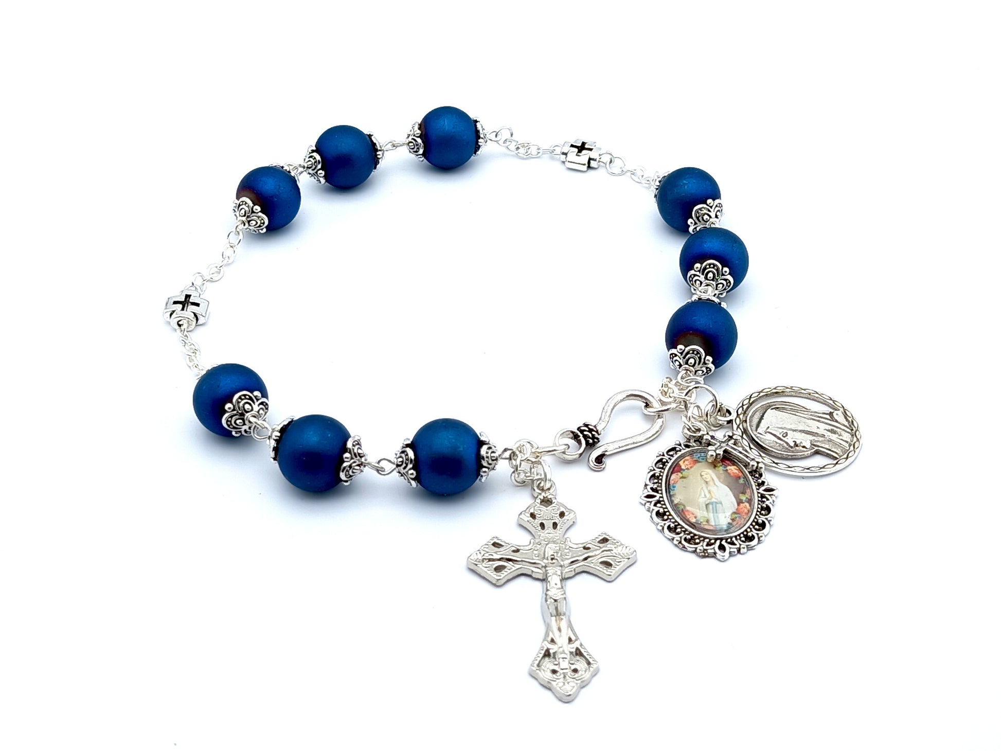 Saint Bernadette unique rosary beads prayer chaplet with blue glass and silver cross beads, silver crucifix and Our Lady of Lourdes picture medal.