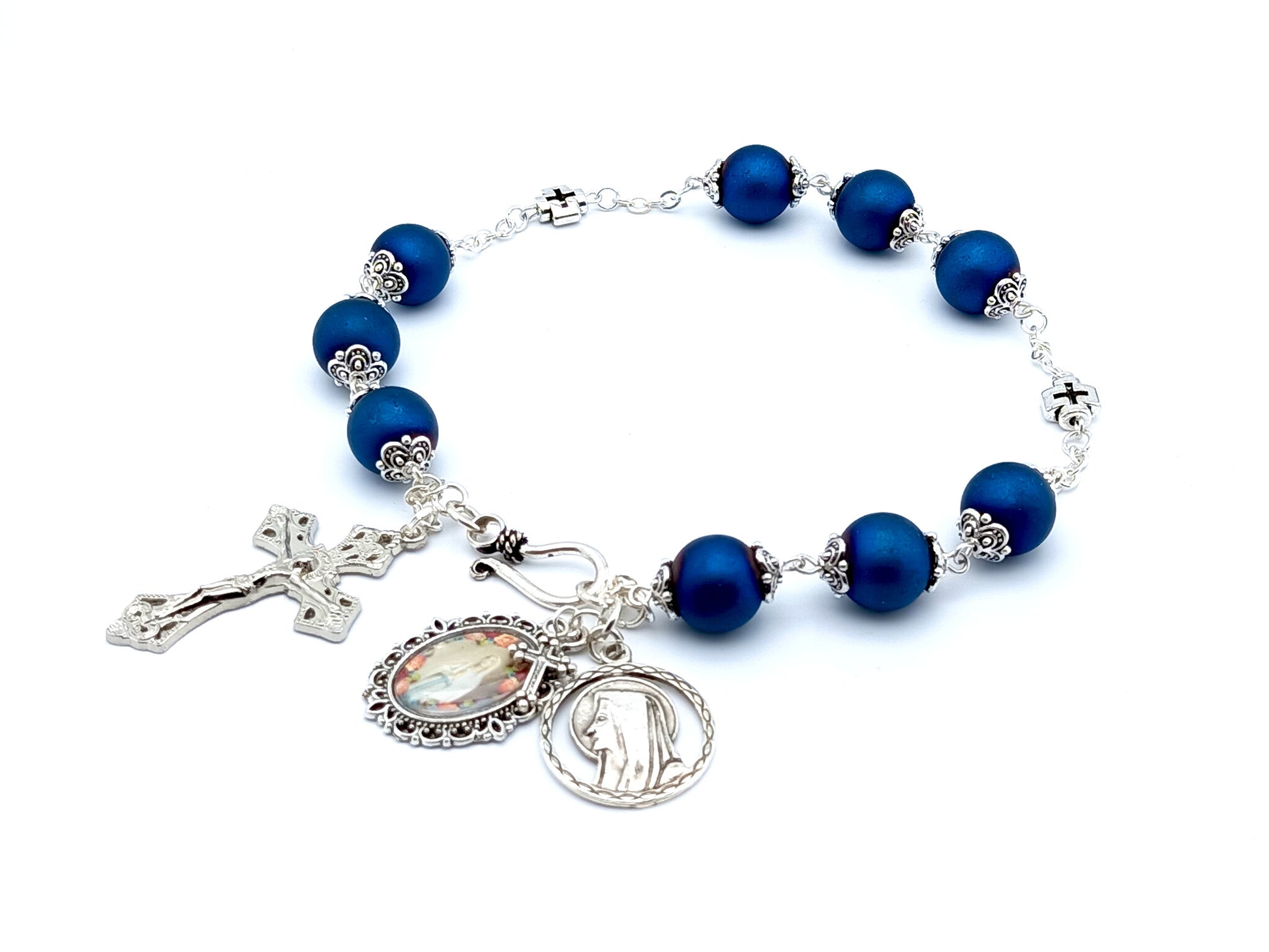 Saint Bernadette unique rosary beads prayer chaplet with blue glass and silver cross beads, silver crucifix and Our Lady of Lourdes picture medal.