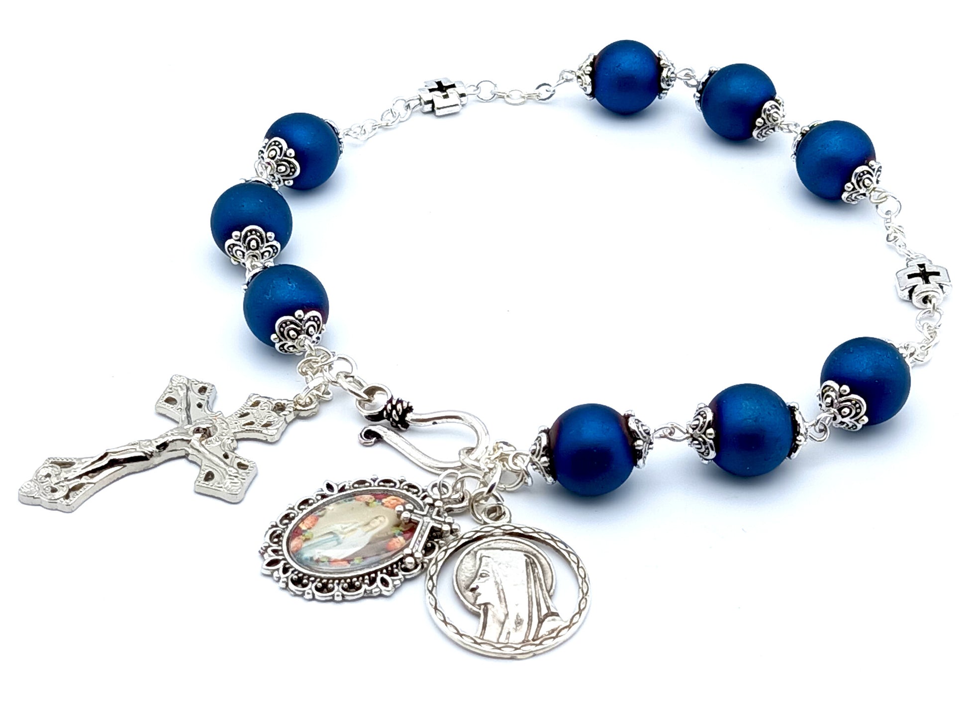 Saint Bernadette unique rosary beads prayer chaplet with blue glass and silver cross beads, silver crucifix and Our Lady of Lourdes picture medal.