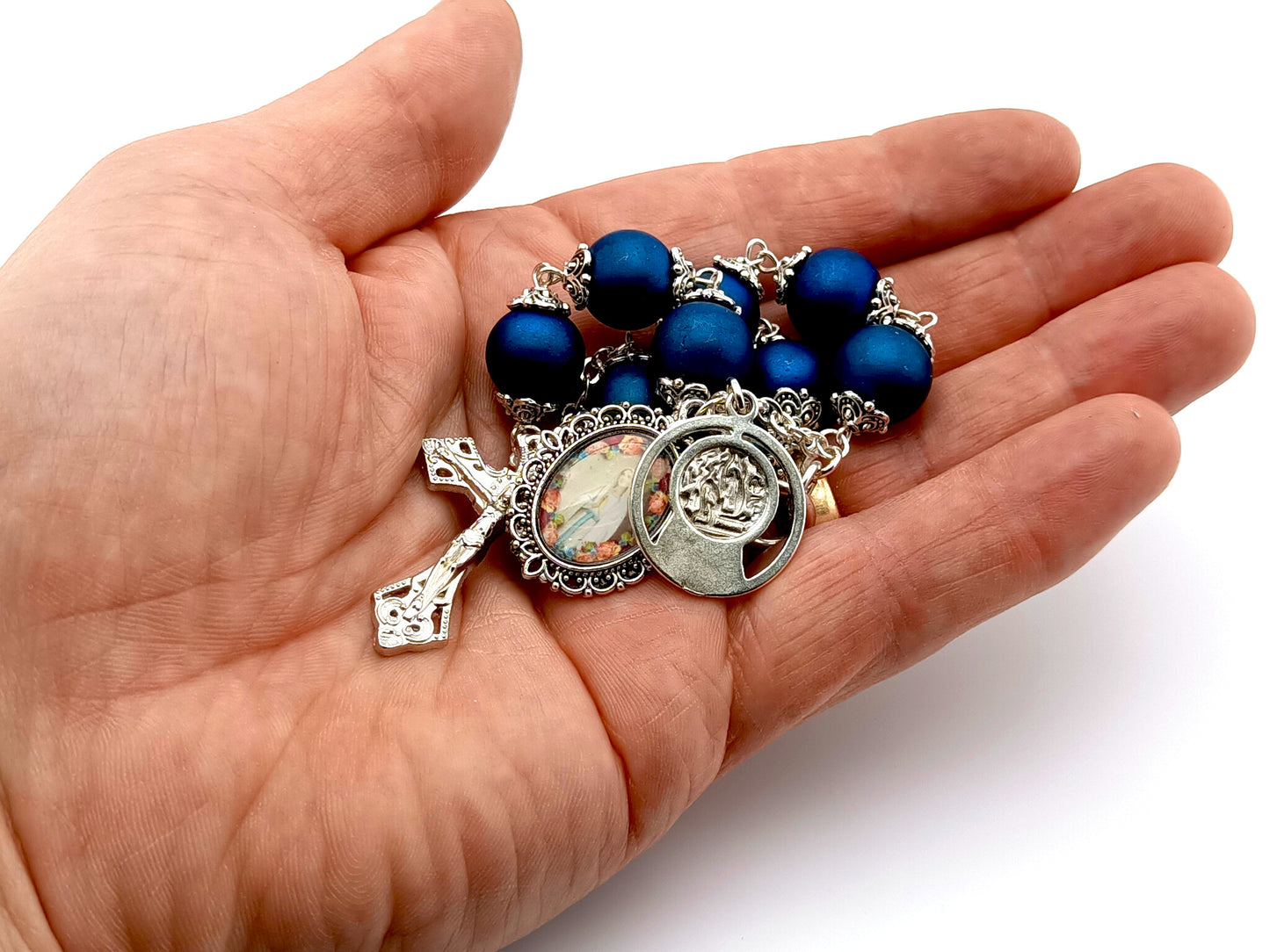 Saint Bernadette unique rosary beads prayer chaplet with blue glass and silver cross beads, silver crucifix and Our Lady of Lourdes picture medal.