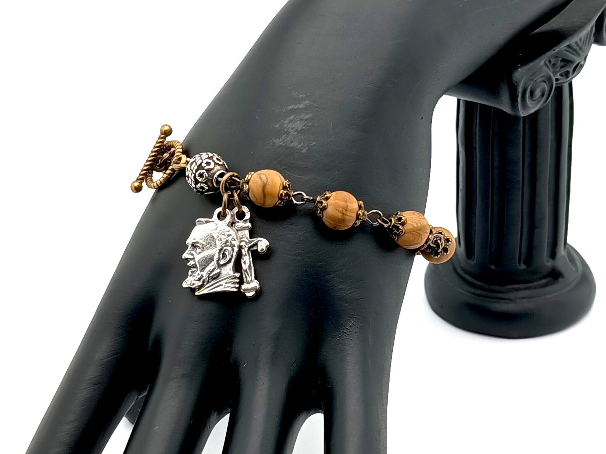 Saint Padre Pio unique rosary beads single decade rosary bracelet with sand wood gemstone and silver beads, silver crucifix and medal and brass toggle clasp. 