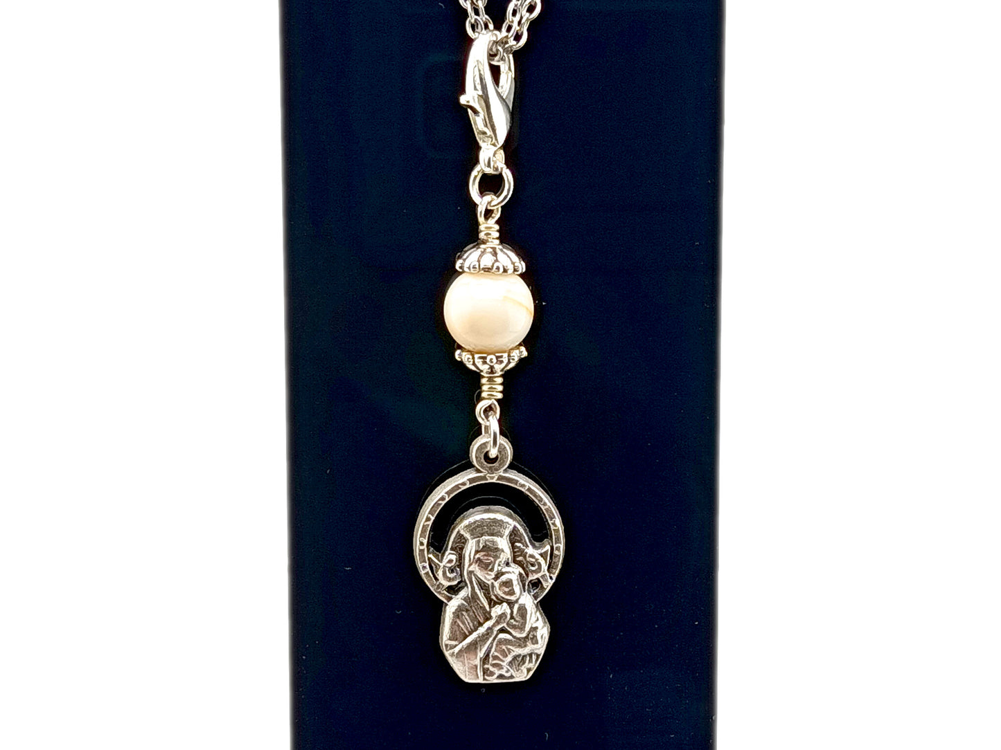 Immaculate Conception unique rosary beads purse clip key chain with mother of pearl bead in unbreakable wire wrapped style with lobster clasp.