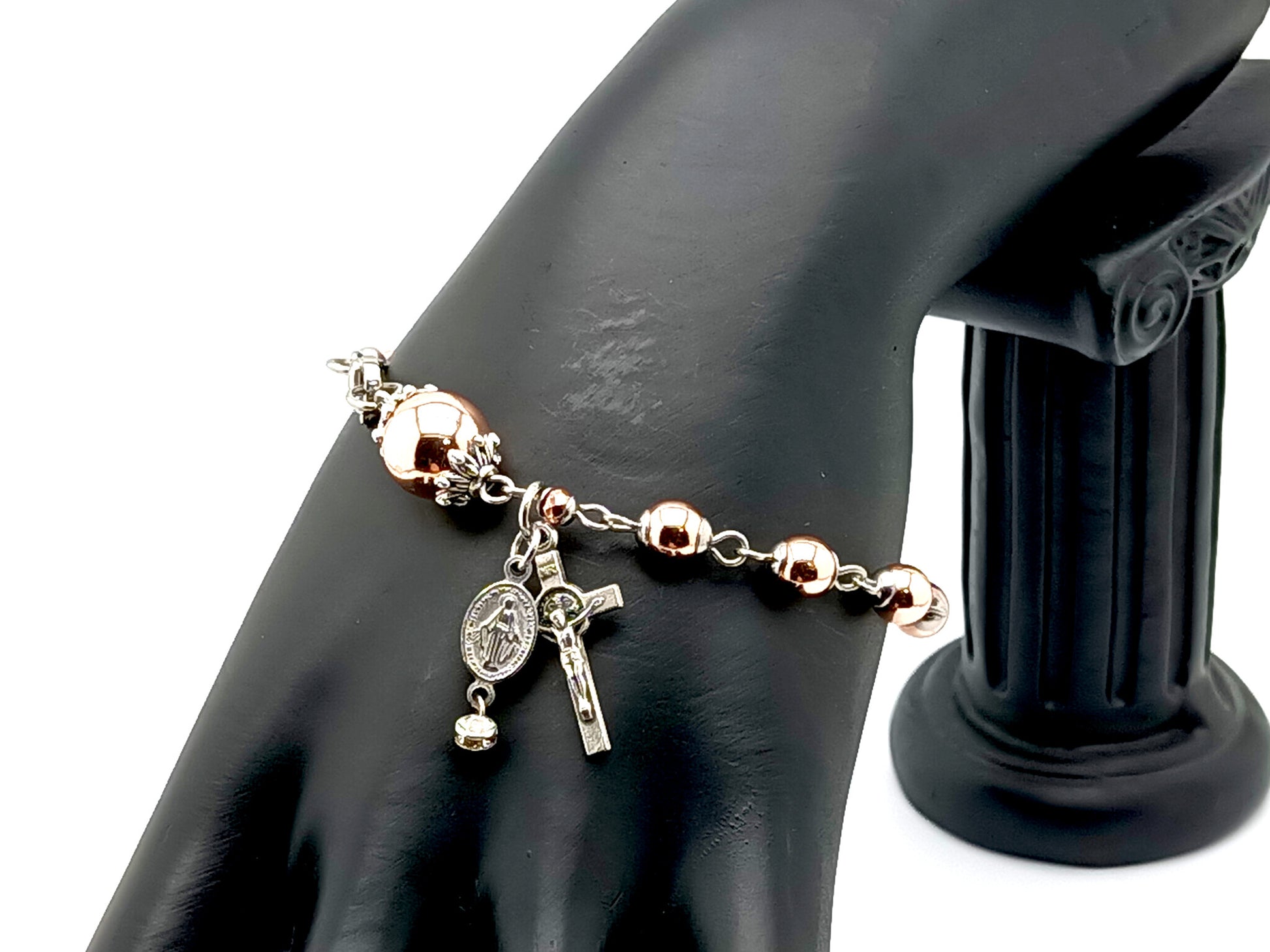 Miraculous medal unique rosary beads rose gold hematite gemstone single decade rosary bracelet and Saint Benedict crucifix.
