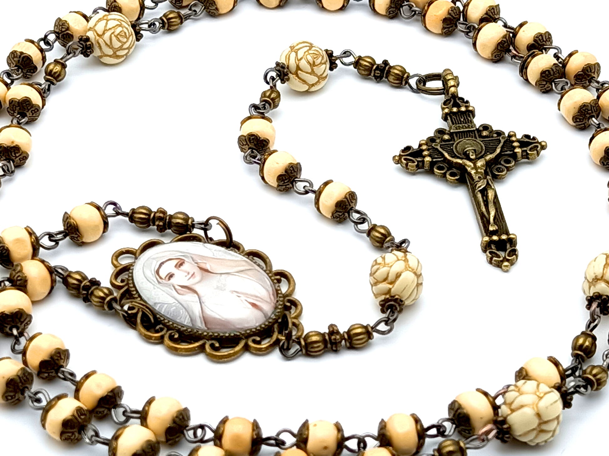 Vintage style Virgin Mary unique rosary beads with wooden and rose beads and filigree brass crucifix.