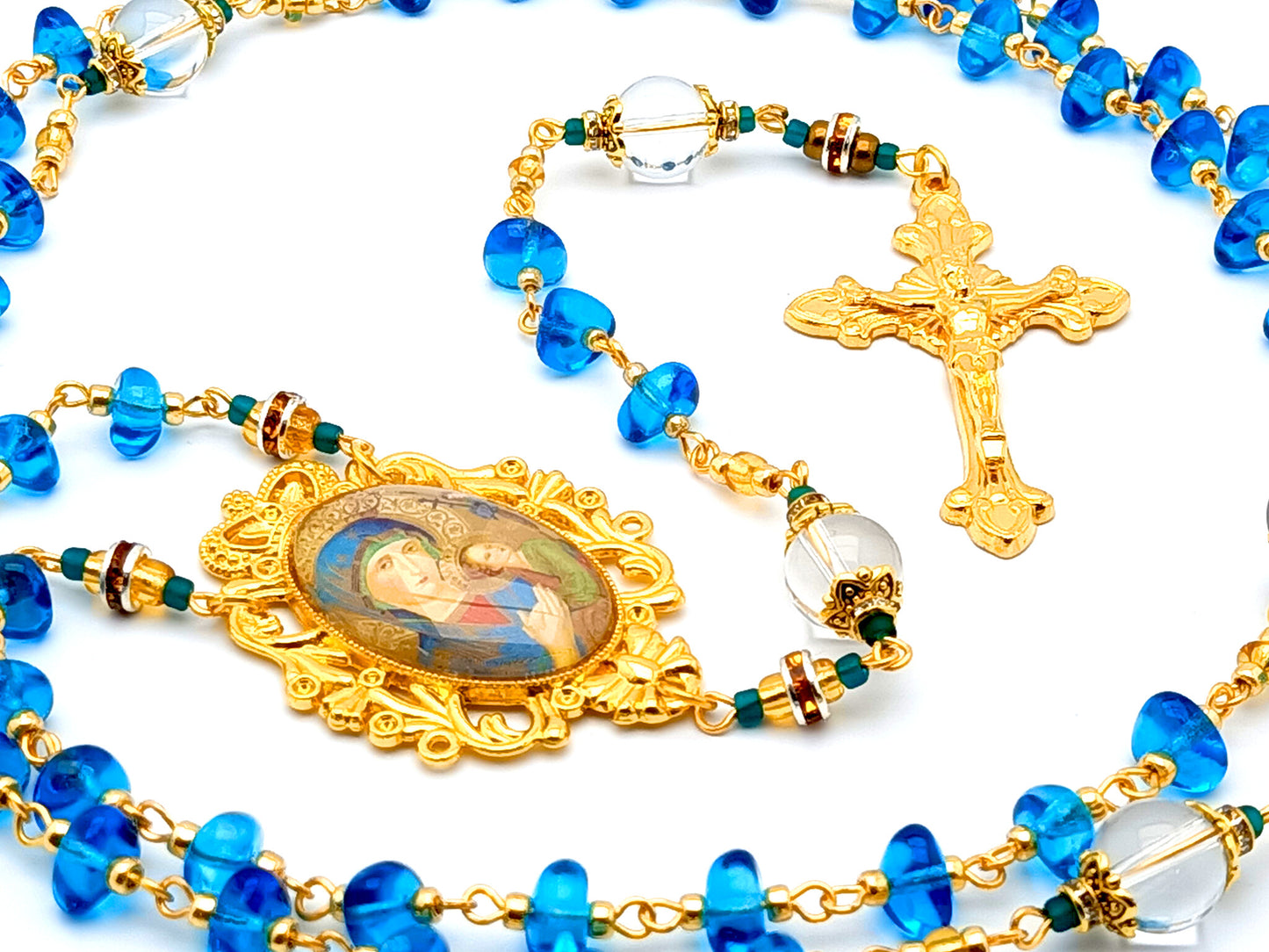 Our Lady of Perpetual Help unique rosary beads with nugget glass and crystal gemstone beads and gold plated sunburst crucifix.