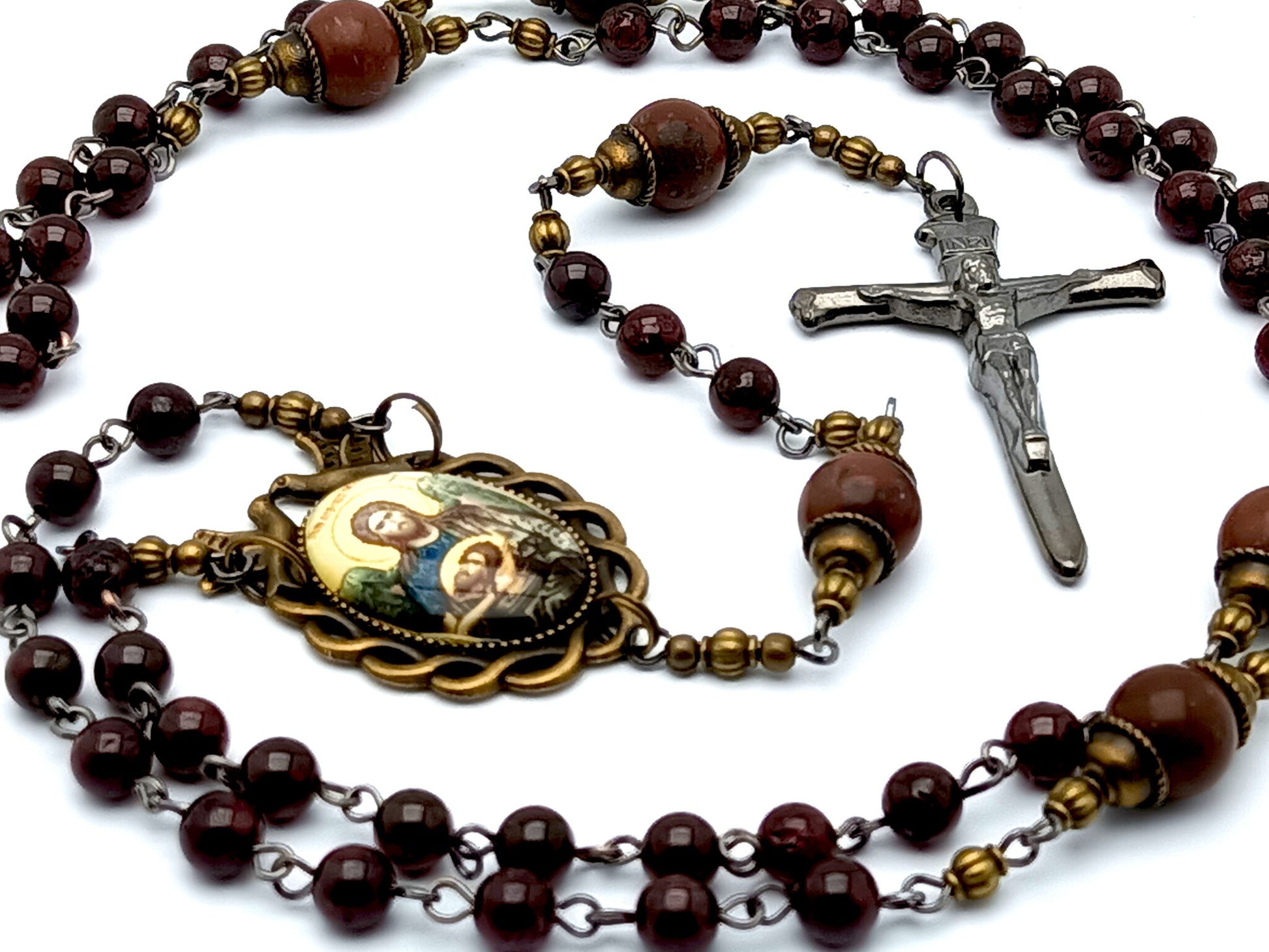 Antique style Saint John the Baptist unique rosary beads with garnet gemstone beads and nail crucifix and Holy Spirit domed center medal.