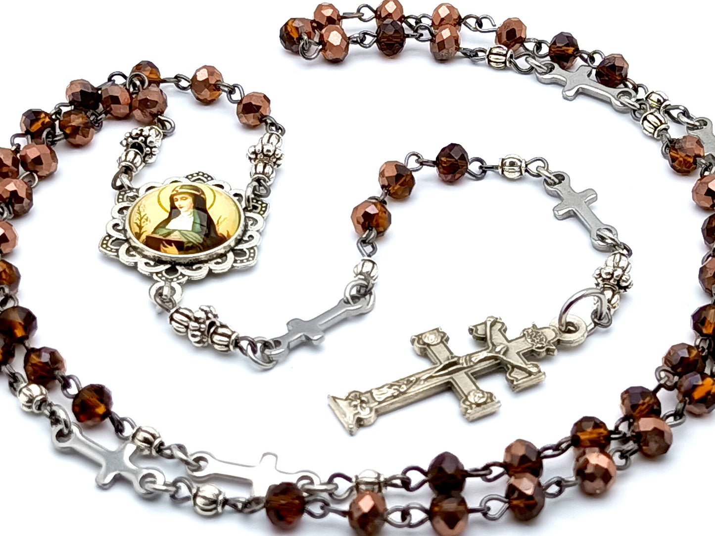 Saint Teresa of Avila unique rosary beads with glass and stainless steel linking cross beads and Caravaca crucifix.