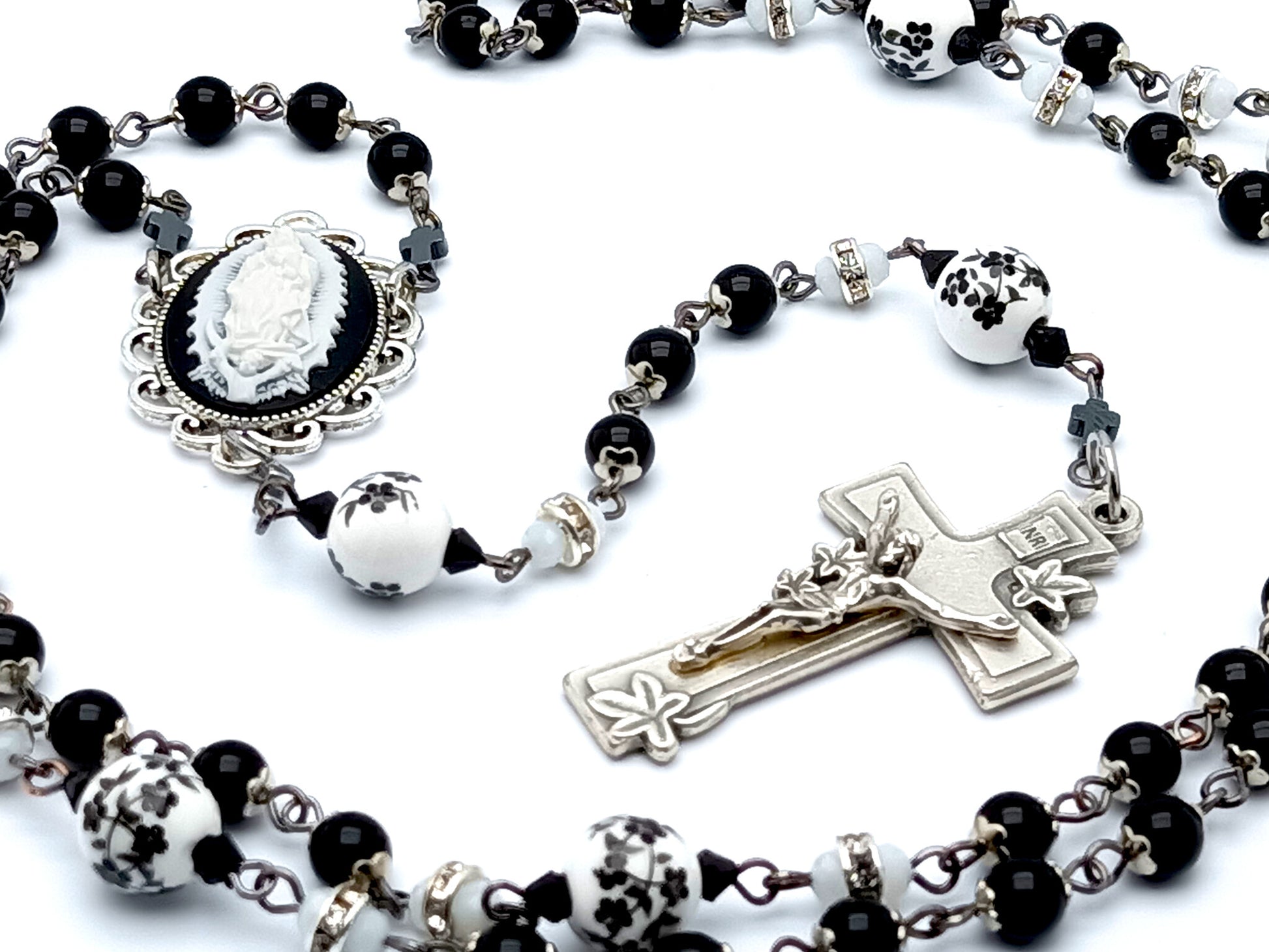 Our Lady of Guadalupe cameo unique rosary beads with onyx gemstone and porcelain beads and lily crucifix.