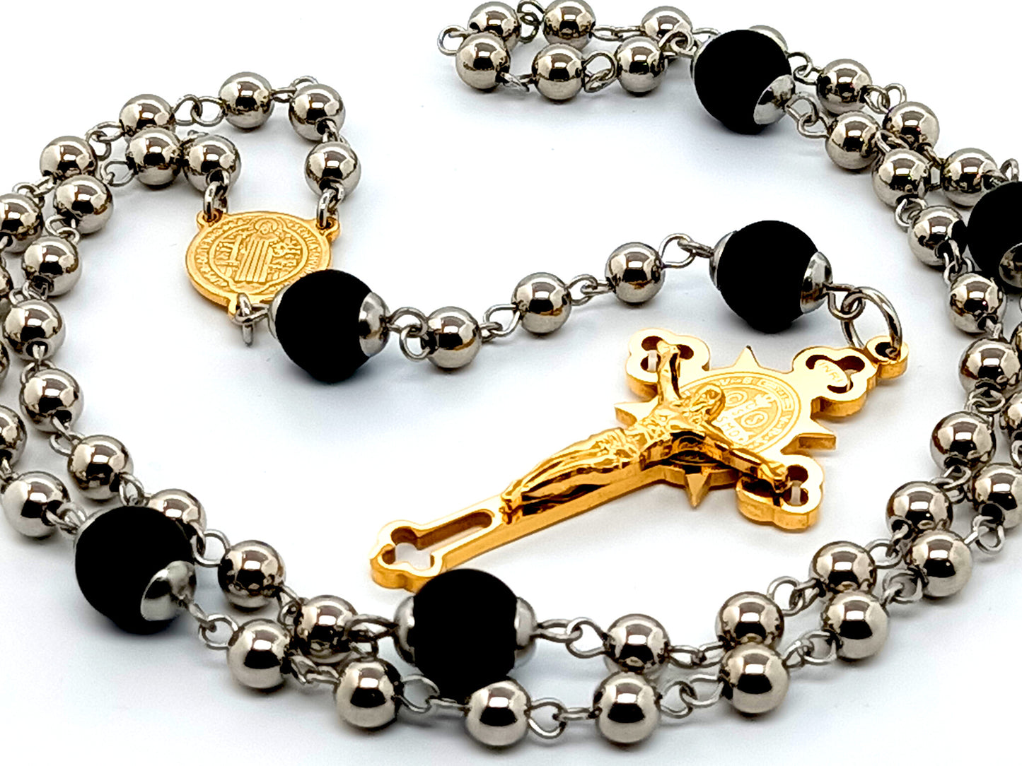 Saint Benedict unique rosary beads with stainless steel and onyx gemstone beads and gold plated stainless steel laser cut crucifix.