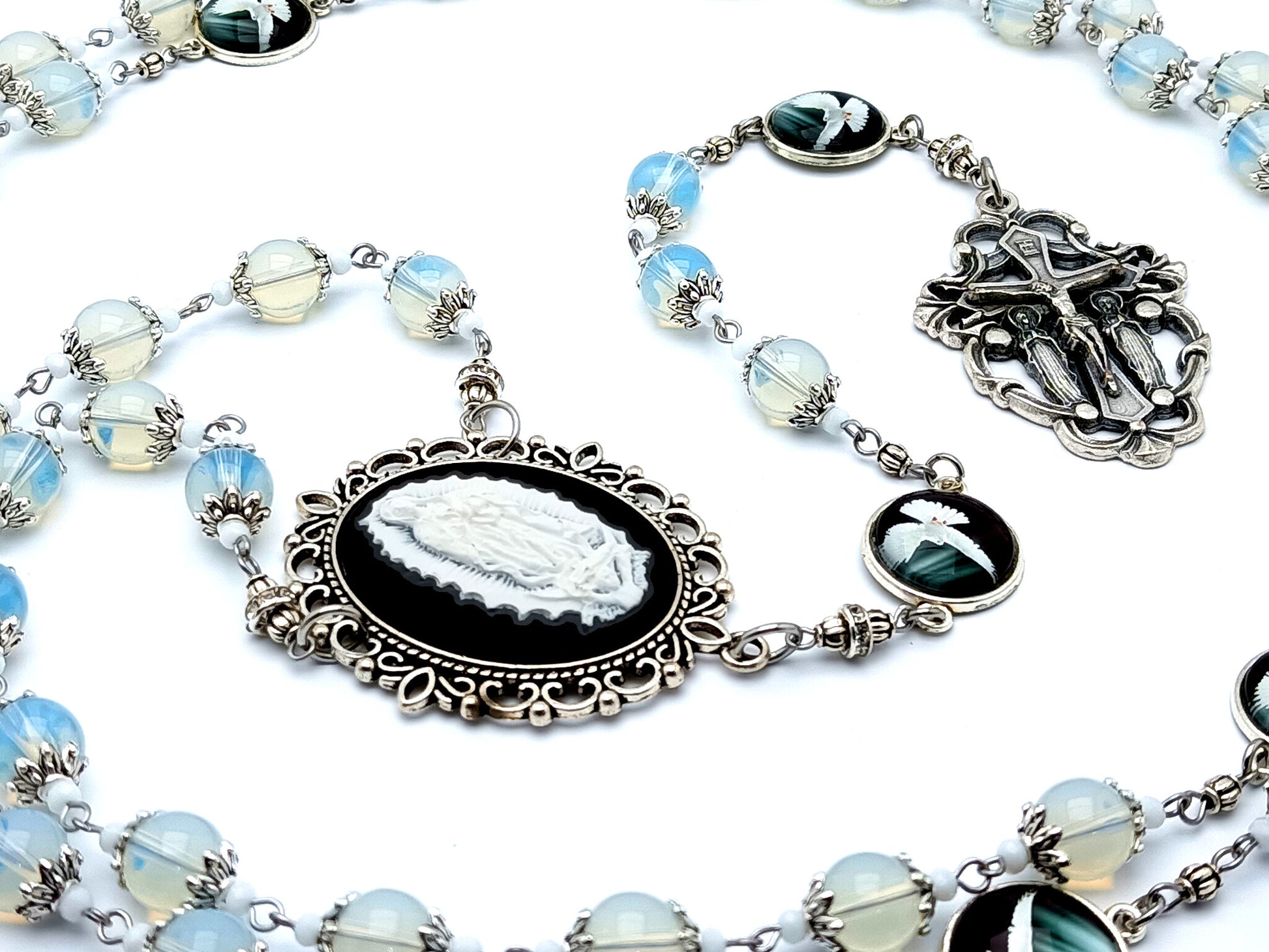 Our Lady of Guadalupe cameo unique rosary beads with opal gemstone beads and Holy Spirit domed picture medals and Holy Angel crucifix.