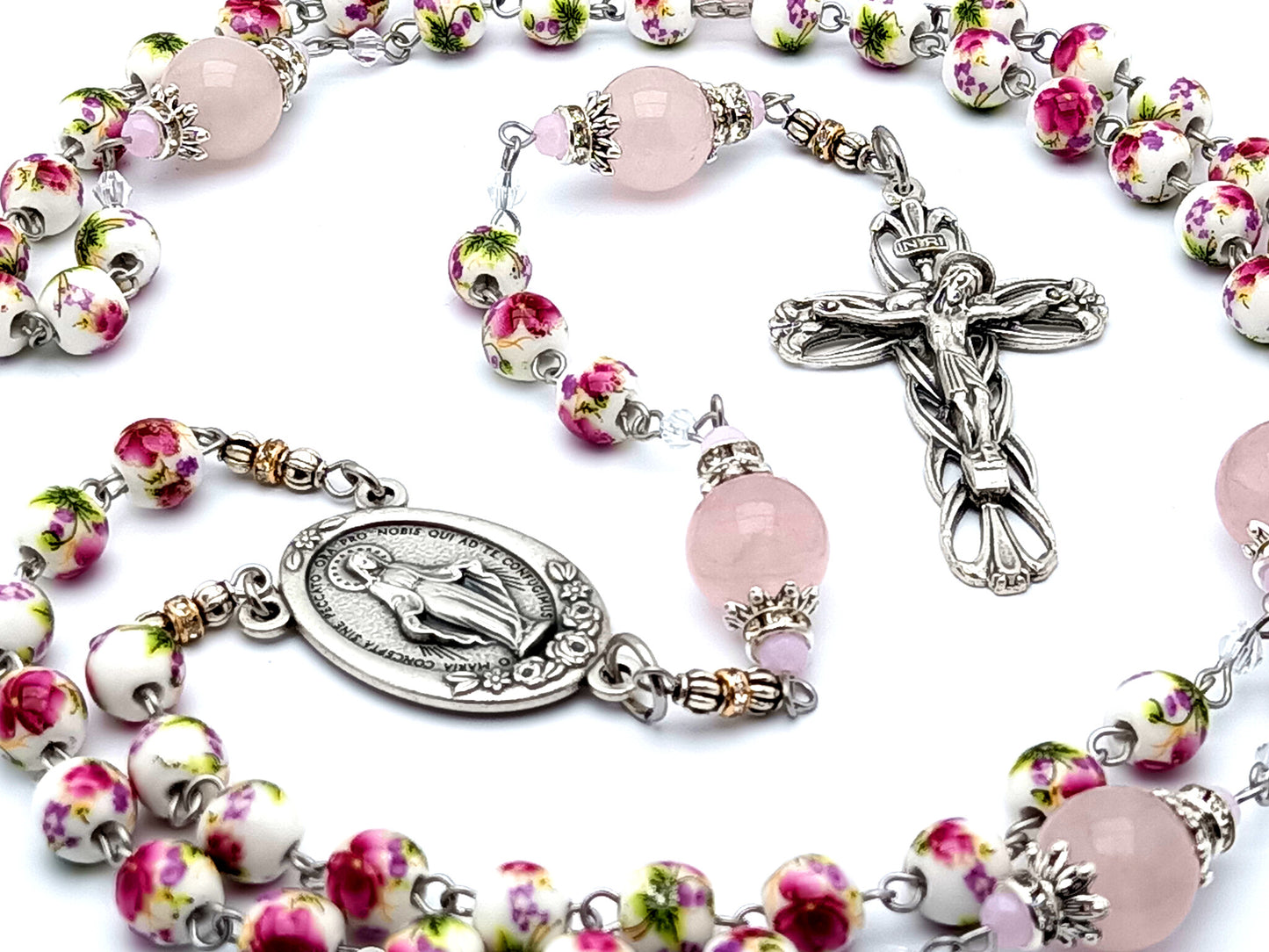 Miraculous medal unique rosary beads with floral porcelain and rose quartz gemstone beads and lily crucifix.