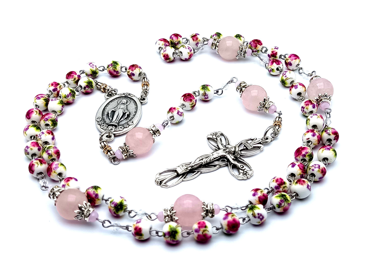 Miraculous medal unique rosary beads with floral porcelain and rose quartz gemstone beads and lily crucifix.