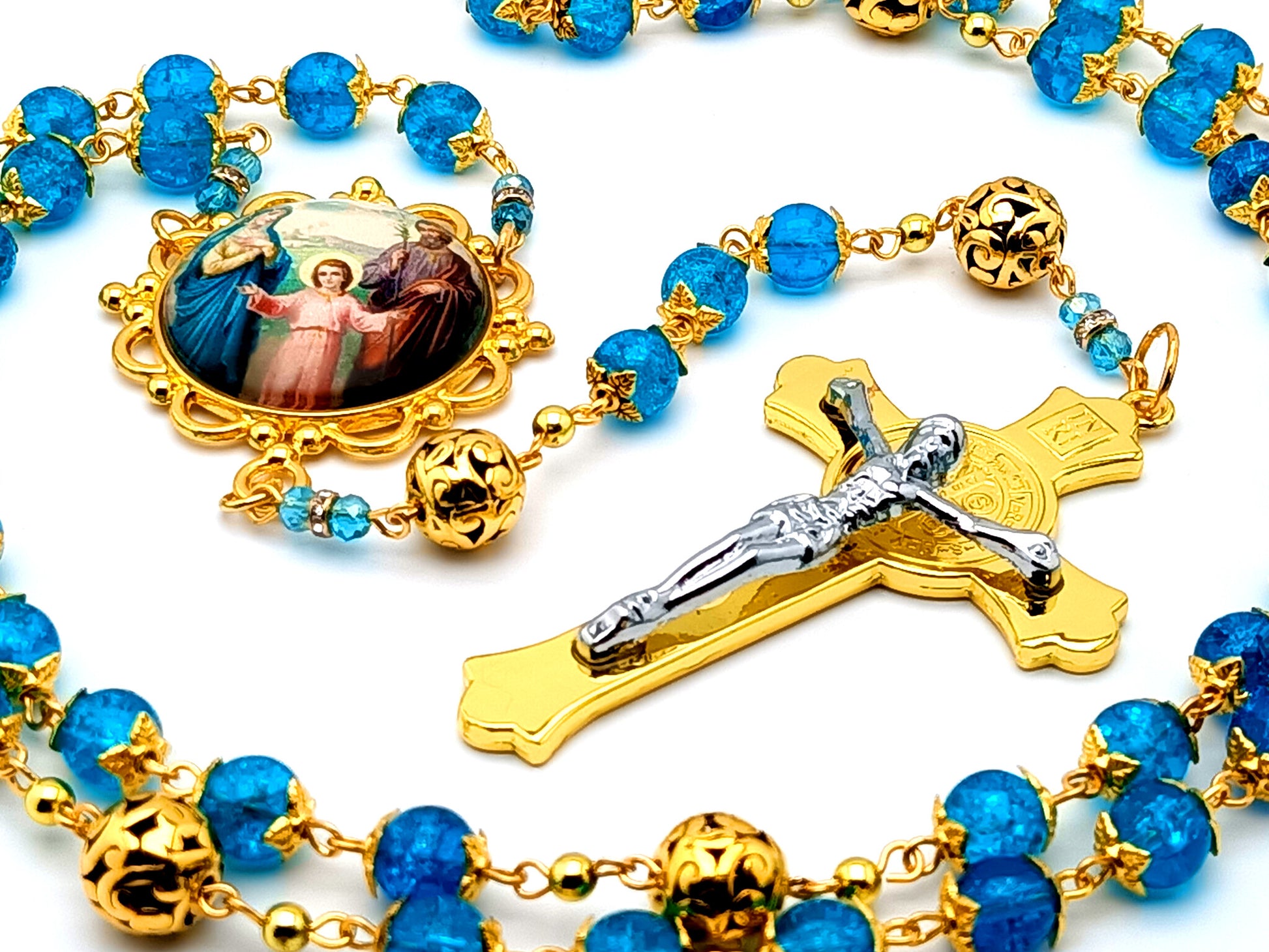 Holy Family unique rosary beads with blue glass and gold beads and large gold plated Saint Benedict crucifix.