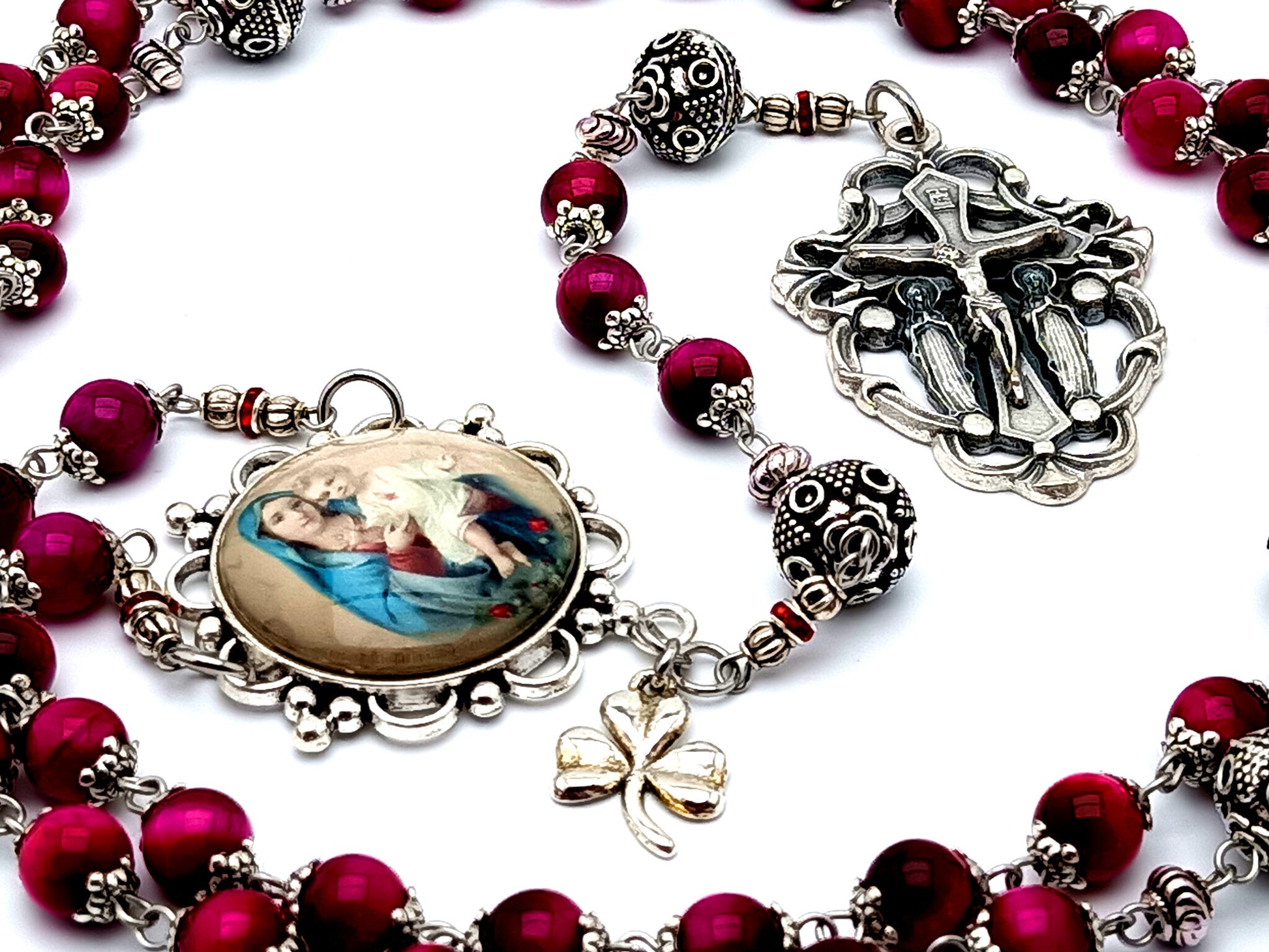 Virgin Mary and Child Jesus unique rosary beads with tigers eye gemstone and Tibetan silver beads and Angel crucifix and Trinity clover leaf medal.