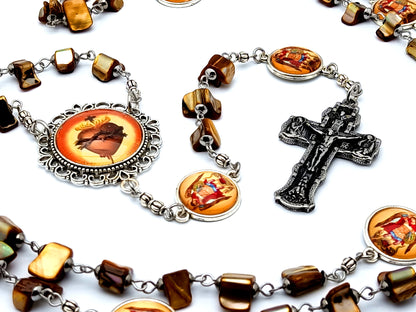 Sacred Heart of Jesus and Saint Michael unique rosary beads with shell beads and Orthodox style stainless steel crucifix.
