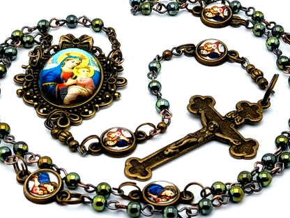 Our Lady of Perpetual Help miniature unique rosary beads with hematite gemstone and Our Lady of Perpetual Succor linking medals and brass crucifix.