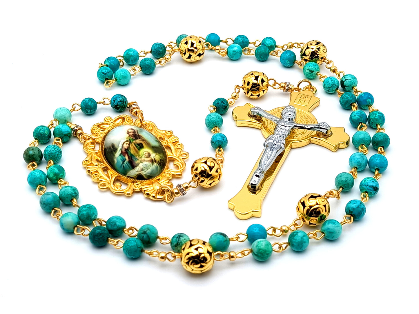 The Nativity unique rosary beads with turquoise gemstone and gold plated Bali beads and Holy Family medal and Saint Benedict gold and silver crucifix.