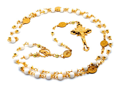 Virgin Mary unique rosary beads with gold and mother of pearl beads and Saint Benedict linking medals and gold plated Saint Benedict engraved crucifix.