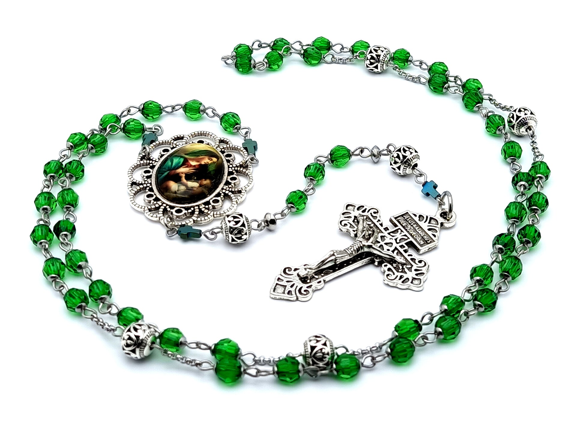 Virgin Mary and child Jesus unique rosary beads with faceted glass beads and silver pardon crucifix.