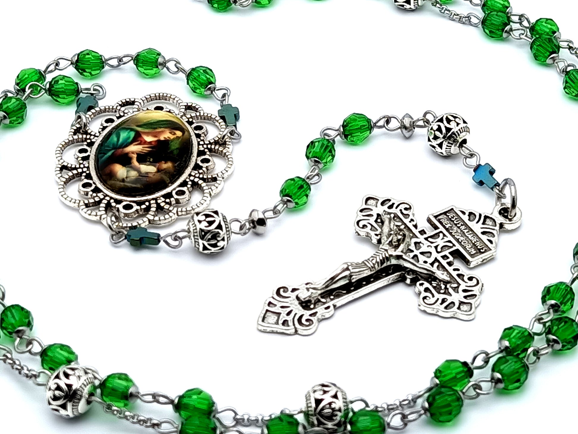 Virgin Mary and child Jesus unique rosary beads with faceted glass beads and silver pardon crucifix.