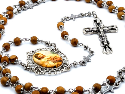 The Good Shepherd unique rosary beads with sand wood gemstone beads and stainless steel linking cross beads and a rope and heart crucifix.