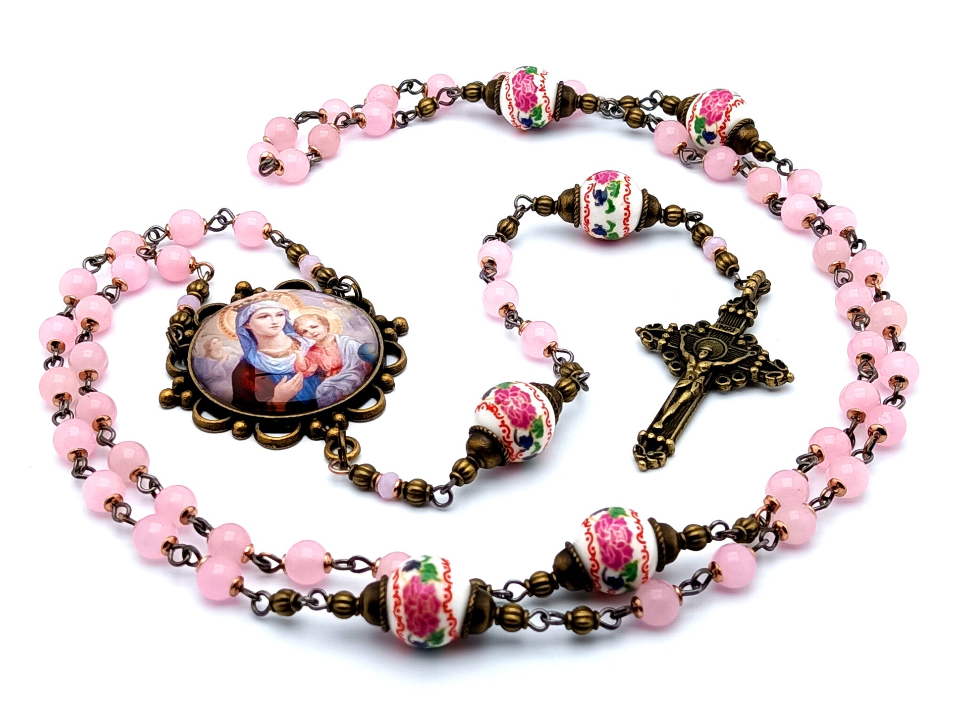Our Lady of Perpetual help unique rosary beads with vintage style rose quartz gemstone and porcelain beads and a brass crucifix.