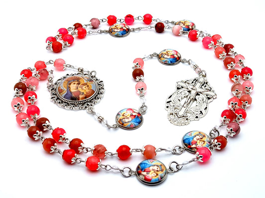 Our Lady of Perpetual help unique rosary beads with rose quartz gemstone and Angel crucifix and Our Lady of Succor picture linking medals.