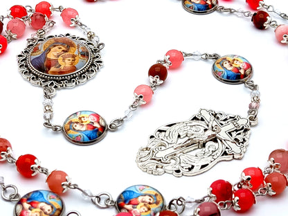 Our Lady of Perpetual help unique rosary beads with rose quartz gemstone and Angel crucifix and Our Lady of Succor picture linking medals.