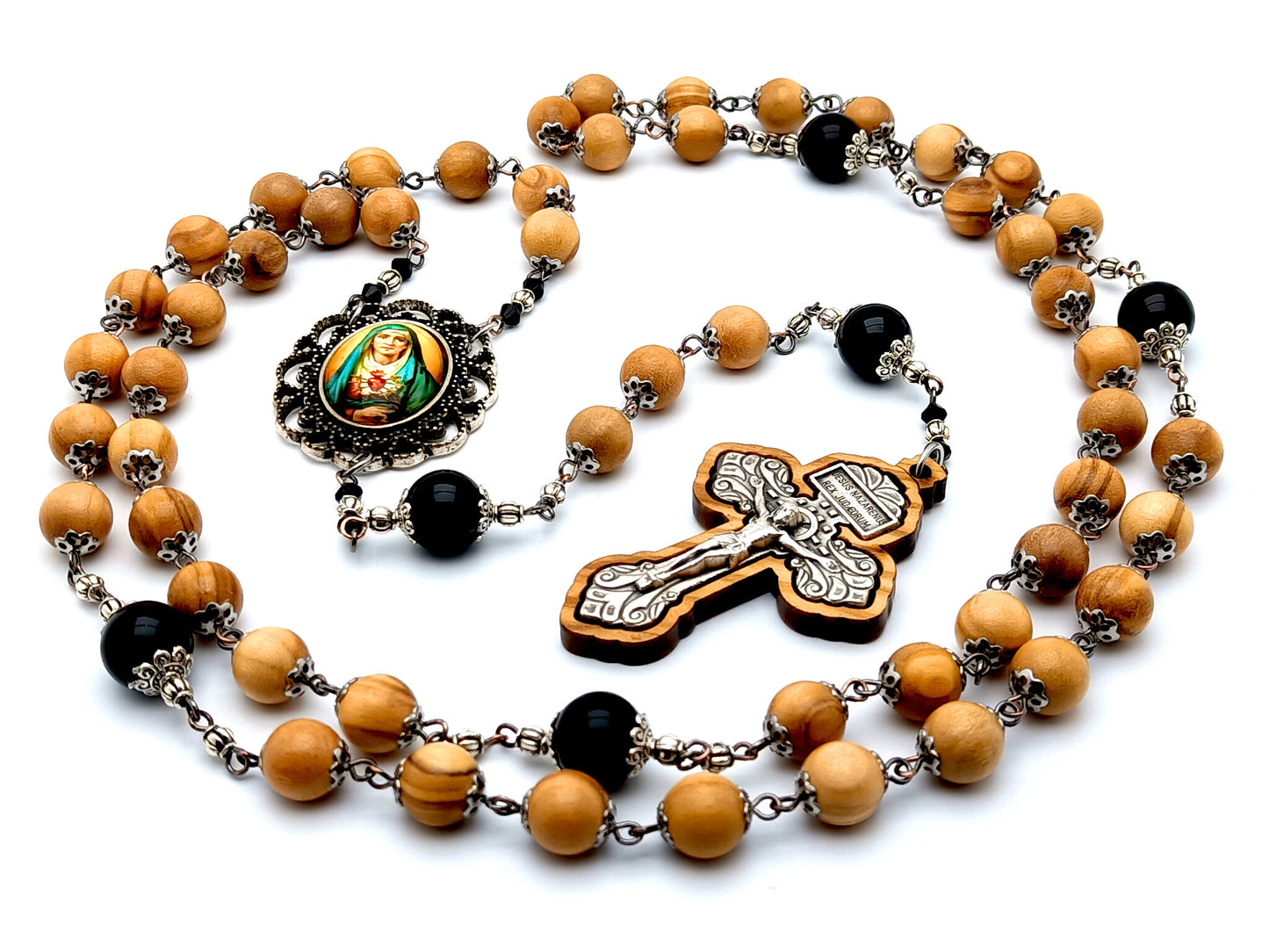 Our Lady of Sorrows unique rosary beads with olive wood and onyx gemstone beads and olive wood framed pardon crucifix.