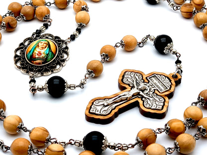 Our Lady of Sorrows unique rosary beads with olive wood and onyx gemstone beads and olive wood framed pardon crucifix.