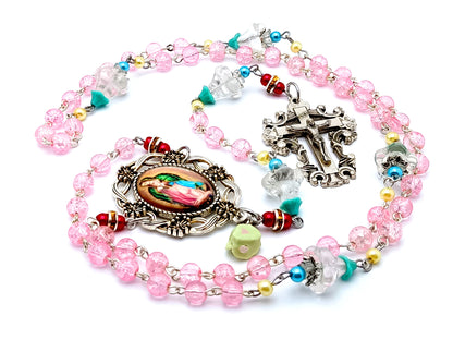 Our Lady of Guadalupe unique rosary beads with crackled glass and flower petal rosary beads and filigree crucifix and floral silver medal frame.