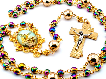 Saint Michael unique rosary beads hematite gemstone rosary beads with gold plated lily crucifix and rose gold Our father beads.