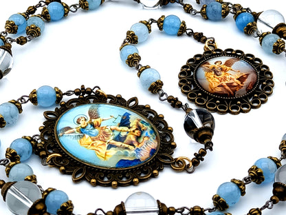 Saint Michael unique rosary beads vintage style aquamarine and crystal gemstone prayer bead chaplet with domed picture medal of Saint Michael.