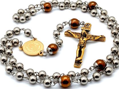 Saint Benedict unique rosary beads stainless steel and hematite gemstone rosary beads with gold plated steel crucifix and gold plated Saint Benedict medal.