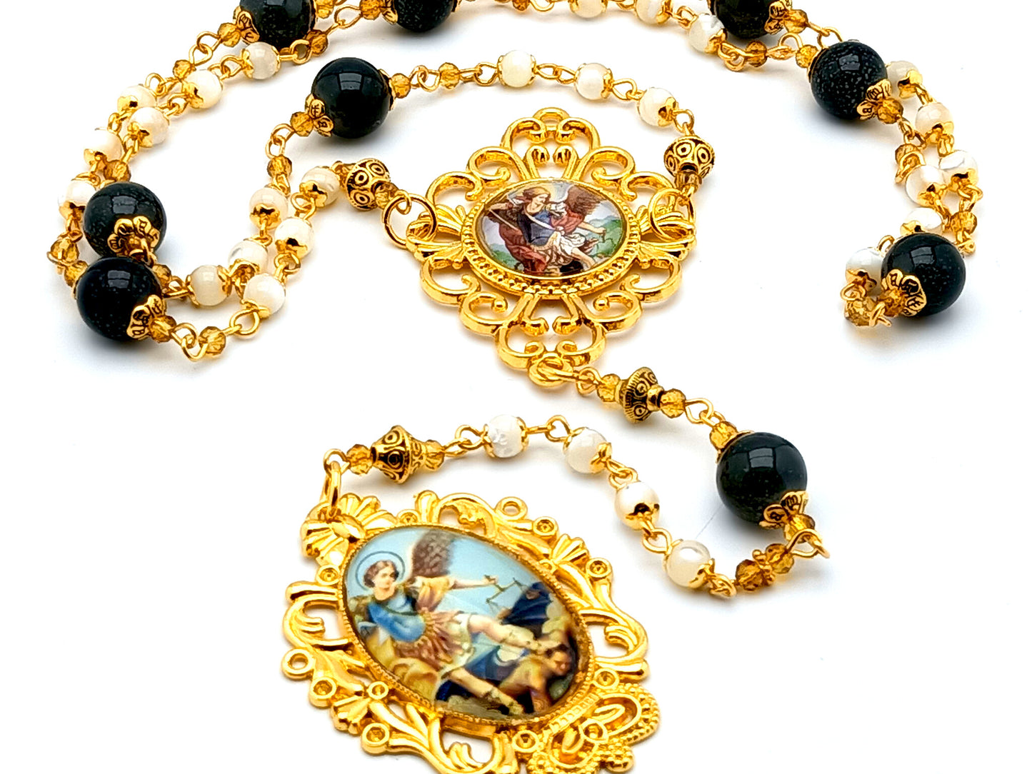 Saint Michael mother of pearl gemstone and gold prayer chaplet with domed Saint Michael picture medal.