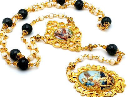 Saint Michael mother of pearl gemstone and gold prayer chaplet with domed Saint Michael picture medal.